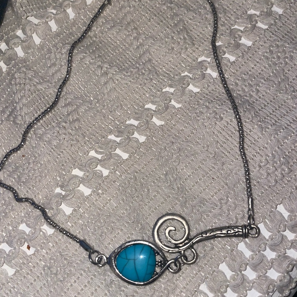 Silver and Blue Necklace with Turquoise Pendant and Artistic Design